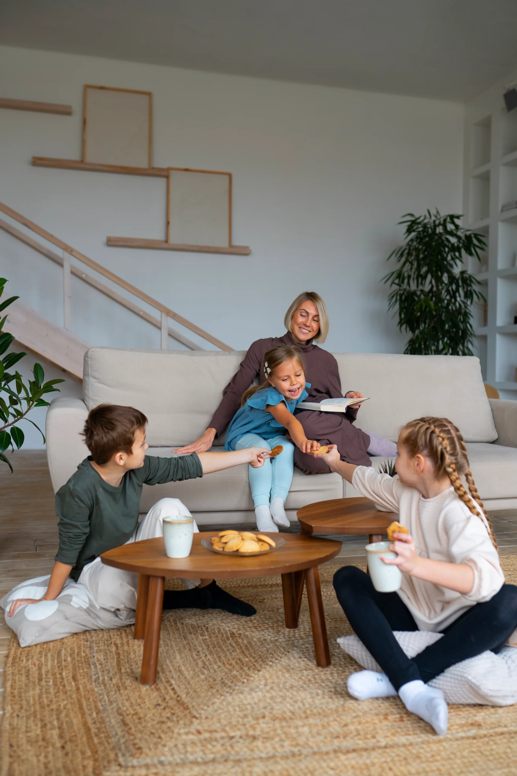 Happy-Family-Clean-Home-Maid-Service Maid Housekeeping Large Families. Large family enjoying a clean and organized home thanks to maid housekeeping services.