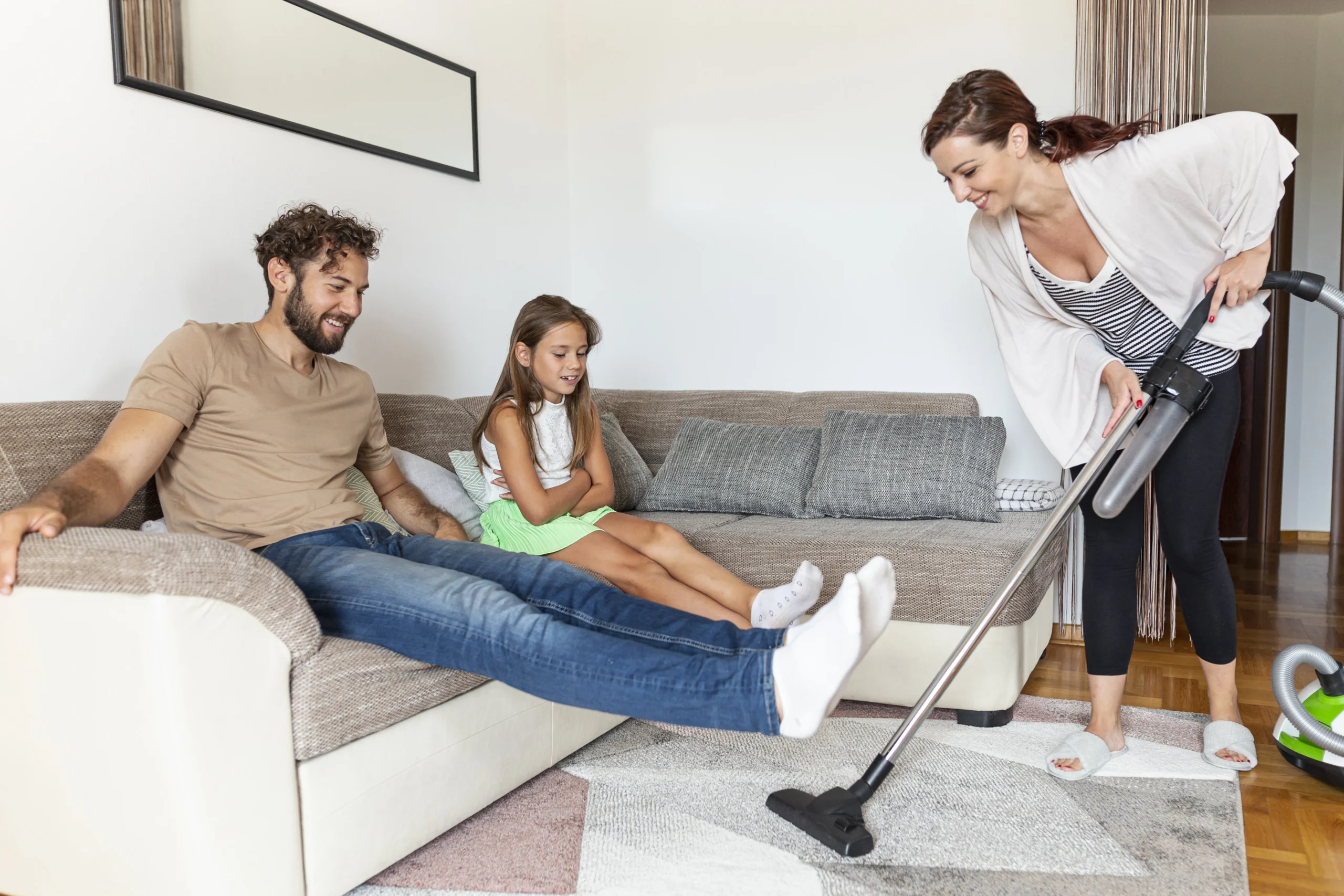 Family enjoying a clean home after professional home cleaning services