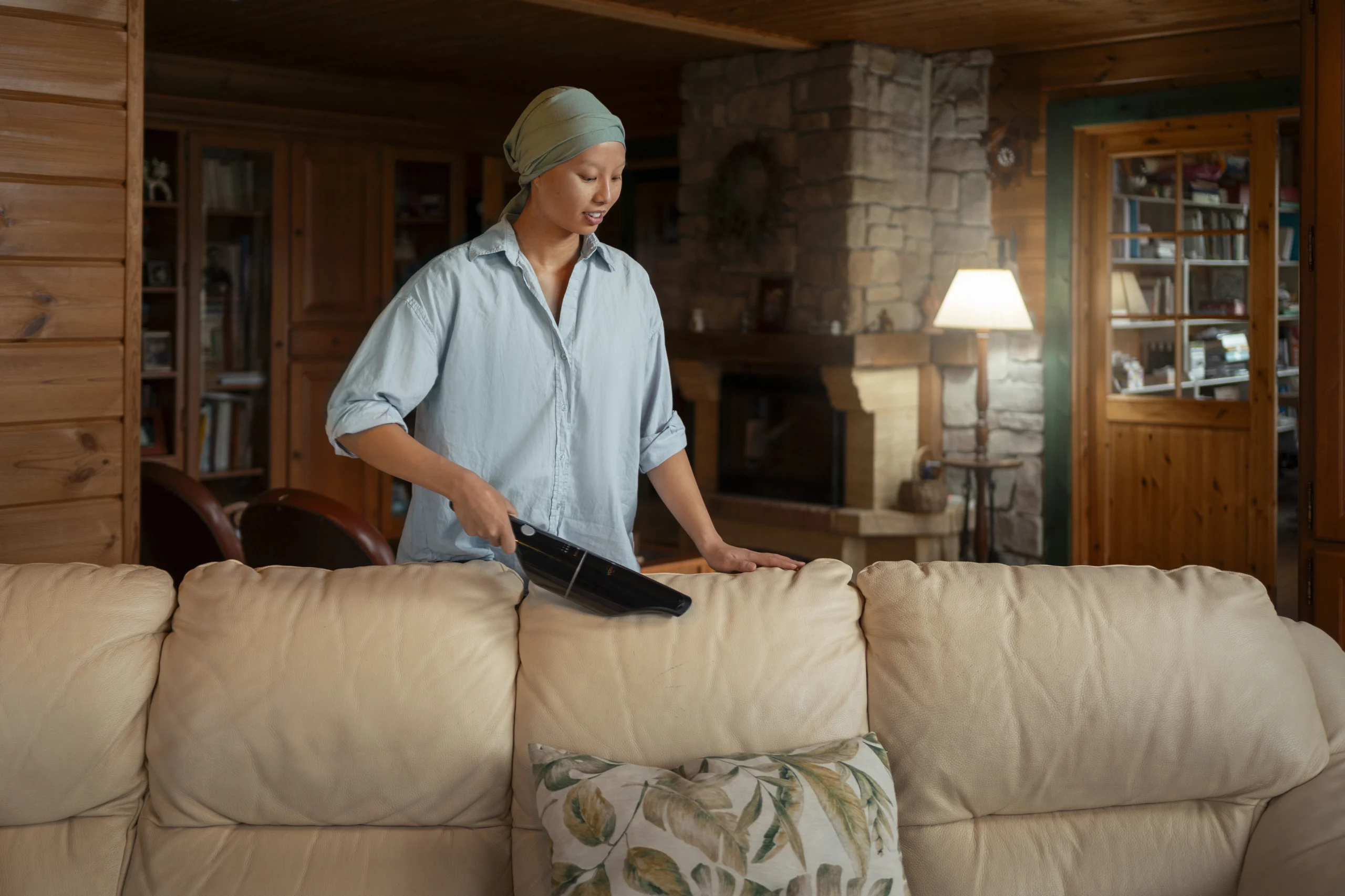 Castle Rock Maid Service Options_ maid cleaning living room in Castle Rock, Colorado