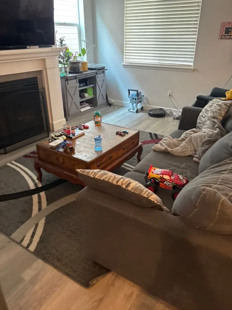 Living room with toys and furniture, preparing for house cleaning services in Castle Pines Villages