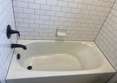 Bathtub and tile professionally cleaned during recurring service by CR Maids